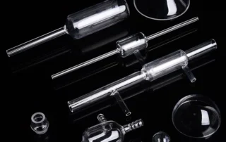 Custom flame‑formed quartz tube components including bends, flares and tapered ends